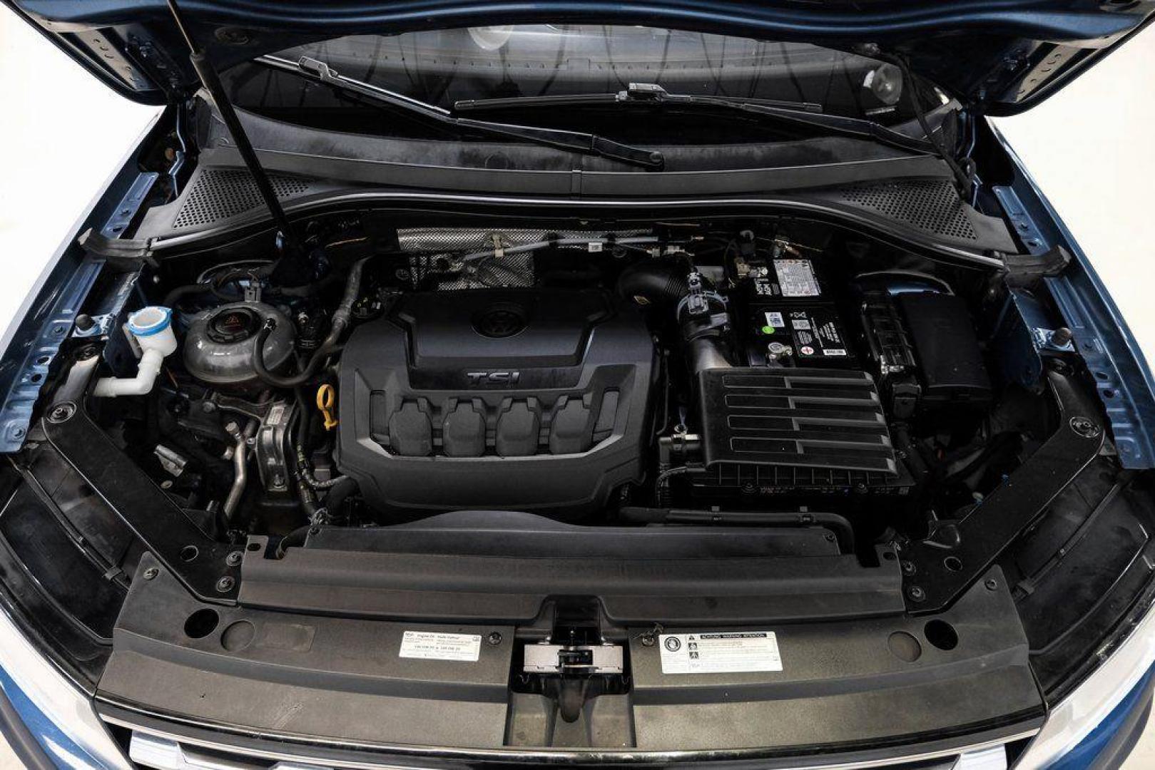 2019 Blue Metallic /Storm Gray Volkswagen Tiguan 2.0T SEL (3VV3B7AX8KM) with an 2.0L TSI DOHC engine, Automatic transmission, located at 15300 Midway Rd., Addison, TX, 75001, (972) 702-0011, 32.958321, -96.838074 - Photo#59