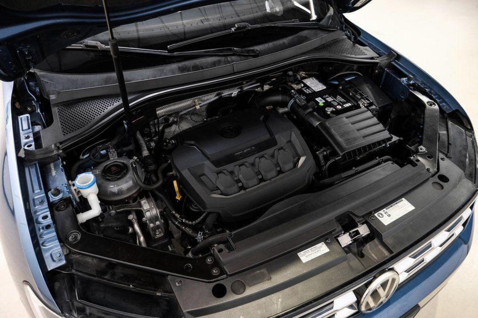 2019 Blue Metallic /Storm Gray Volkswagen Tiguan 2.0T SEL (3VV3B7AX8KM) with an 2.0L TSI DOHC engine, Automatic transmission, located at 15300 Midway Rd., Addison, TX, 75001, (972) 702-0011, 32.958321, -96.838074 - Photo#60