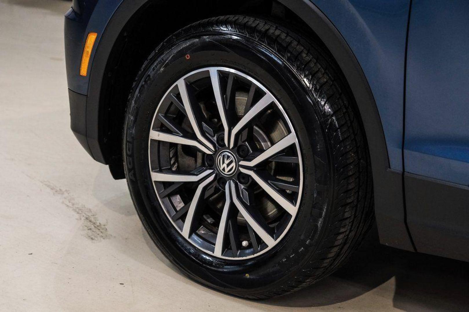 2019 Blue Metallic /Storm Gray Volkswagen Tiguan 2.0T SEL (3VV3B7AX8KM) with an 2.0L TSI DOHC engine, Automatic transmission, located at 15300 Midway Rd., Addison, TX, 75001, (972) 702-0011, 32.958321, -96.838074 - Photo#63