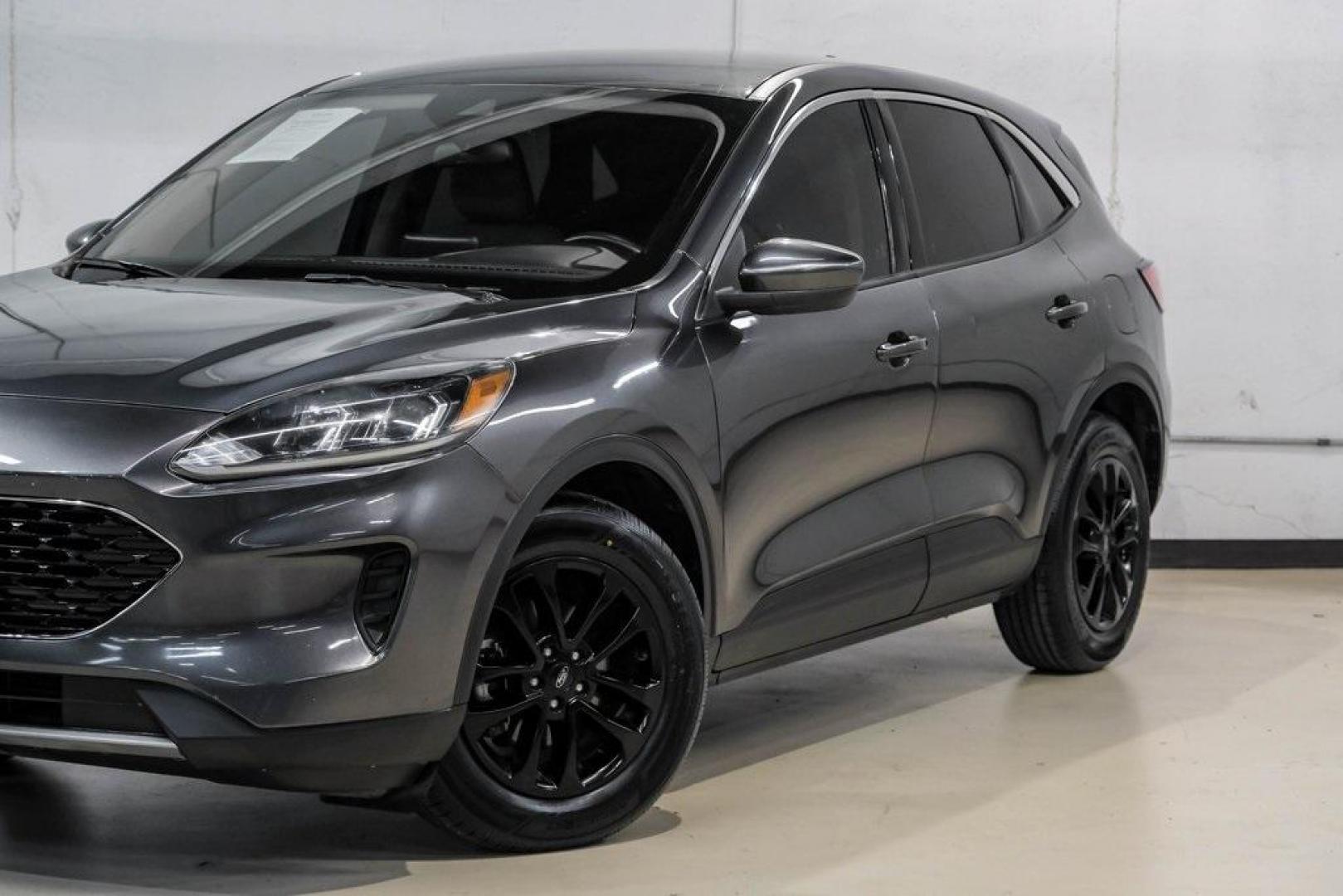 2020 Magnetic /Ebony Ford Escape SE (1FMCU0G62LU) with an 1.5L EcoBoost engine, Automatic transmission, located at 15300 Midway Rd., Addison, TX, 75001, (972) 702-0011, 32.958321, -96.838074 - Photo#5