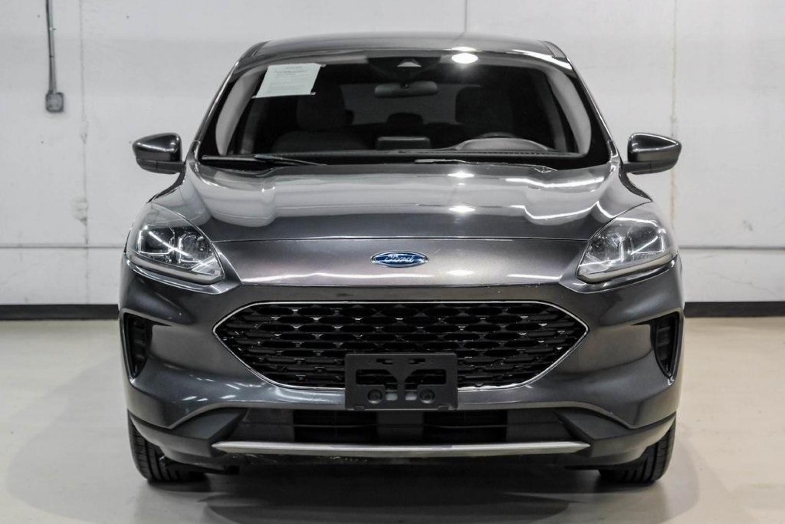 2020 Magnetic /Ebony Ford Escape SE (1FMCU0G62LU) with an 1.5L EcoBoost engine, Automatic transmission, located at 15300 Midway Rd., Addison, TX, 75001, (972) 702-0011, 32.958321, -96.838074 - Photo#6