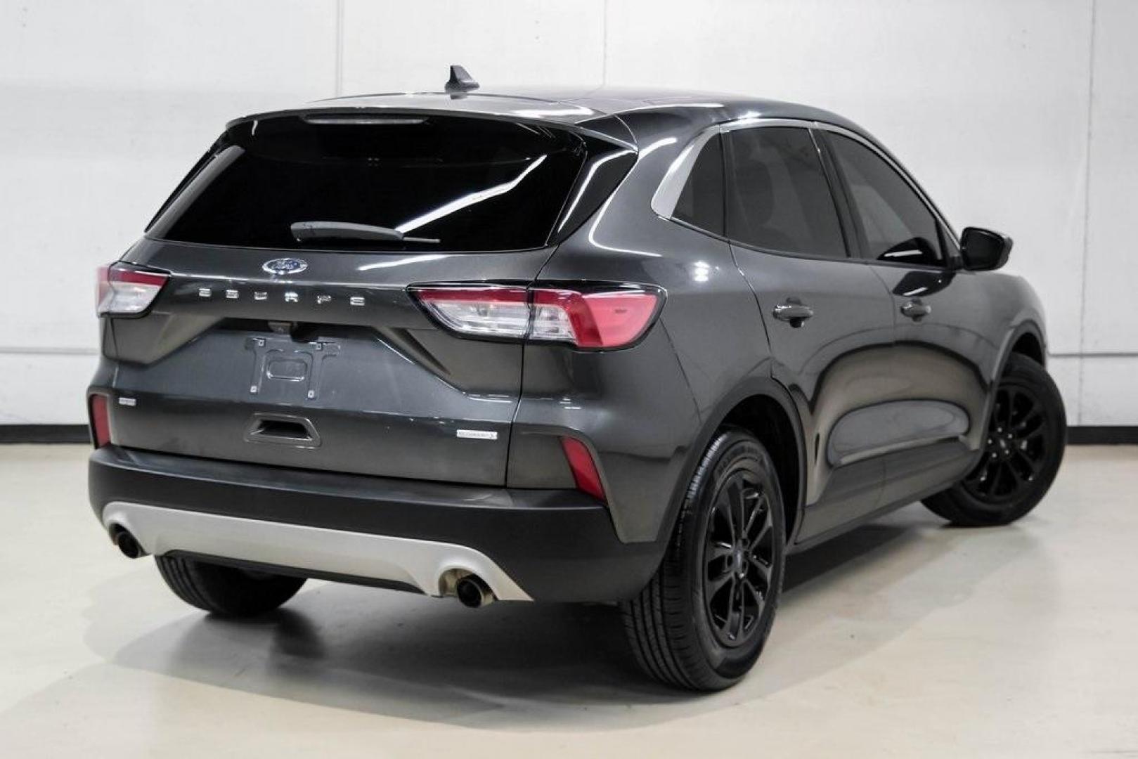 2020 Magnetic /Ebony Ford Escape SE (1FMCU0G62LU) with an 1.5L EcoBoost engine, Automatic transmission, located at 15300 Midway Rd., Addison, TX, 75001, (972) 702-0011, 32.958321, -96.838074 - Photo#9