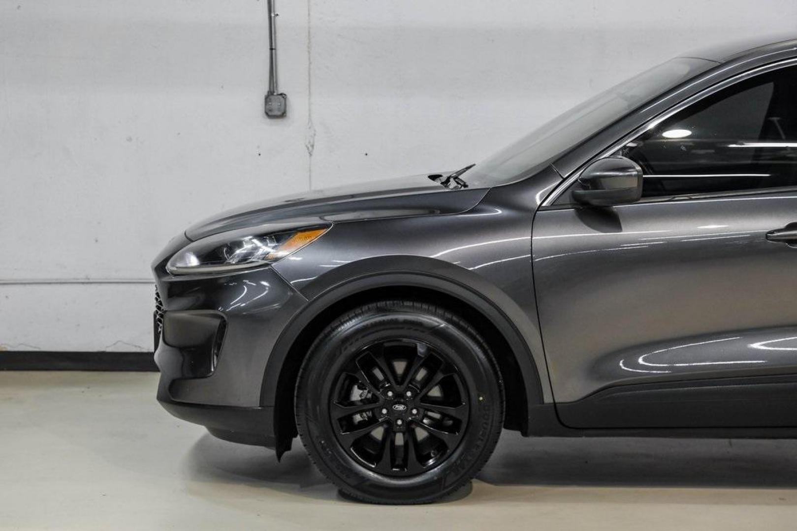 2020 Magnetic /Ebony Ford Escape SE (1FMCU0G62LU) with an 1.5L EcoBoost engine, Automatic transmission, located at 15300 Midway Rd., Addison, TX, 75001, (972) 702-0011, 32.958321, -96.838074 - Photo#14