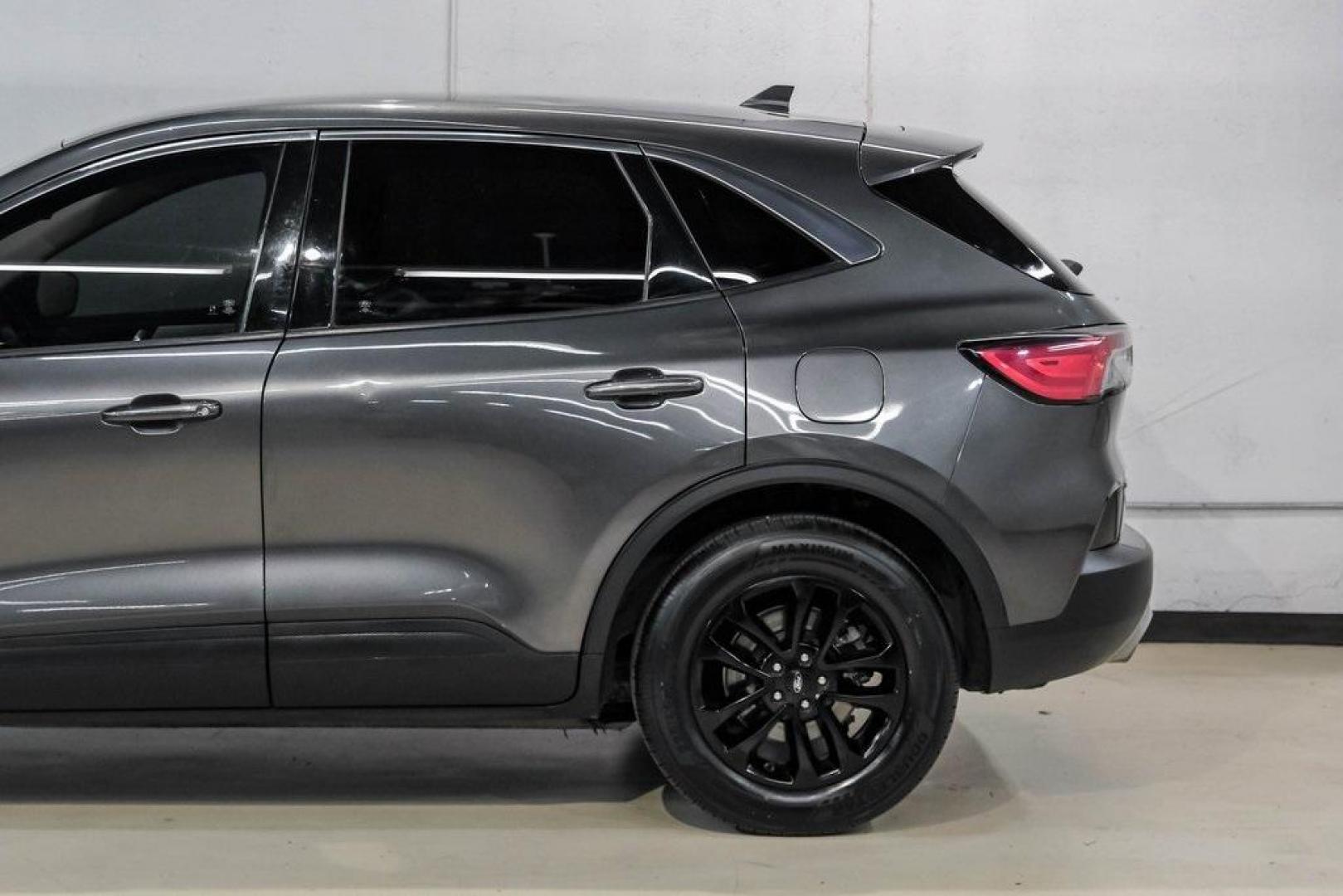 2020 Magnetic /Ebony Ford Escape SE (1FMCU0G62LU) with an 1.5L EcoBoost engine, Automatic transmission, located at 15300 Midway Rd., Addison, TX, 75001, (972) 702-0011, 32.958321, -96.838074 - Photo#15