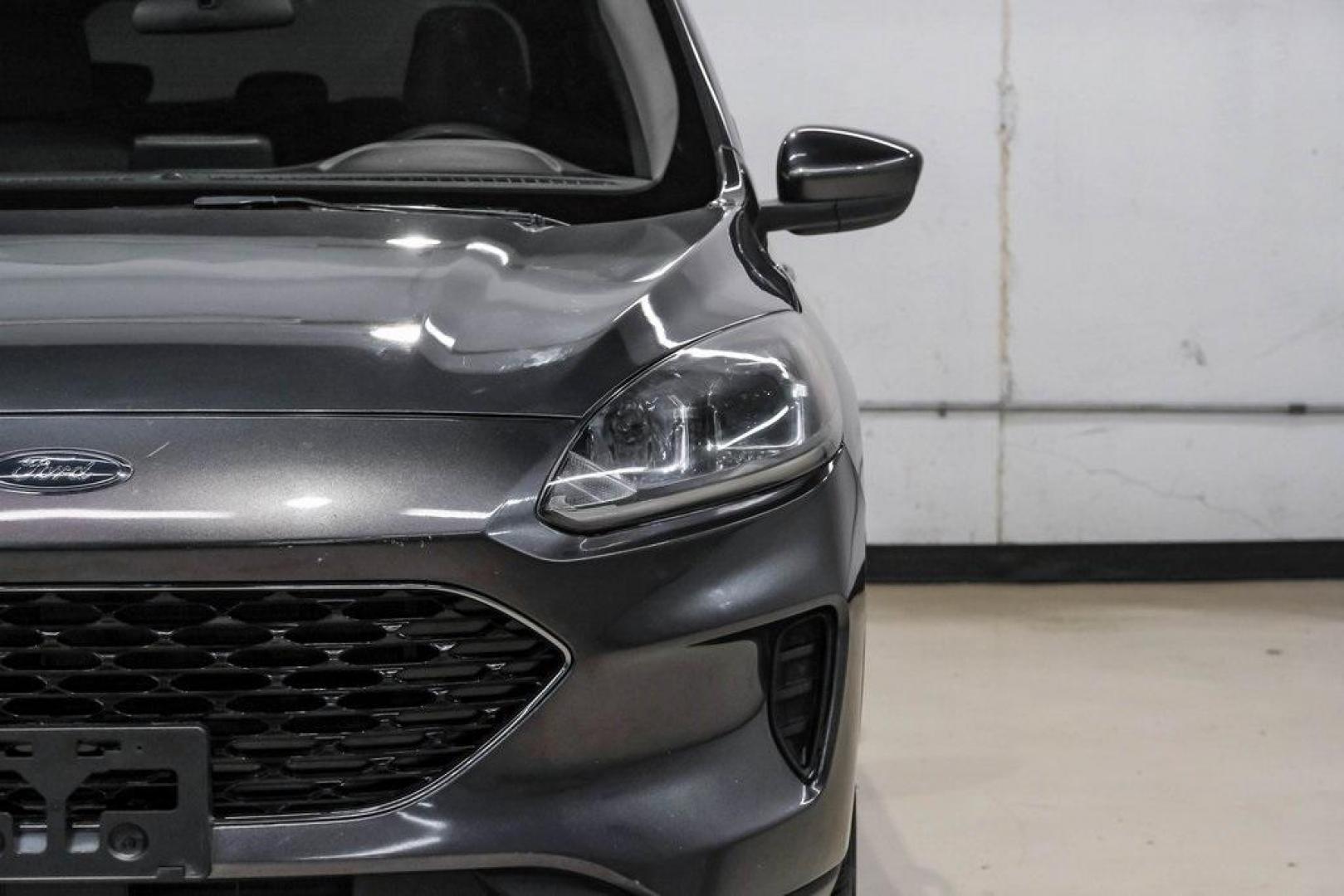 2020 Magnetic /Ebony Ford Escape SE (1FMCU0G62LU) with an 1.5L EcoBoost engine, Automatic transmission, located at 15300 Midway Rd., Addison, TX, 75001, (972) 702-0011, 32.958321, -96.838074 - Photo#53