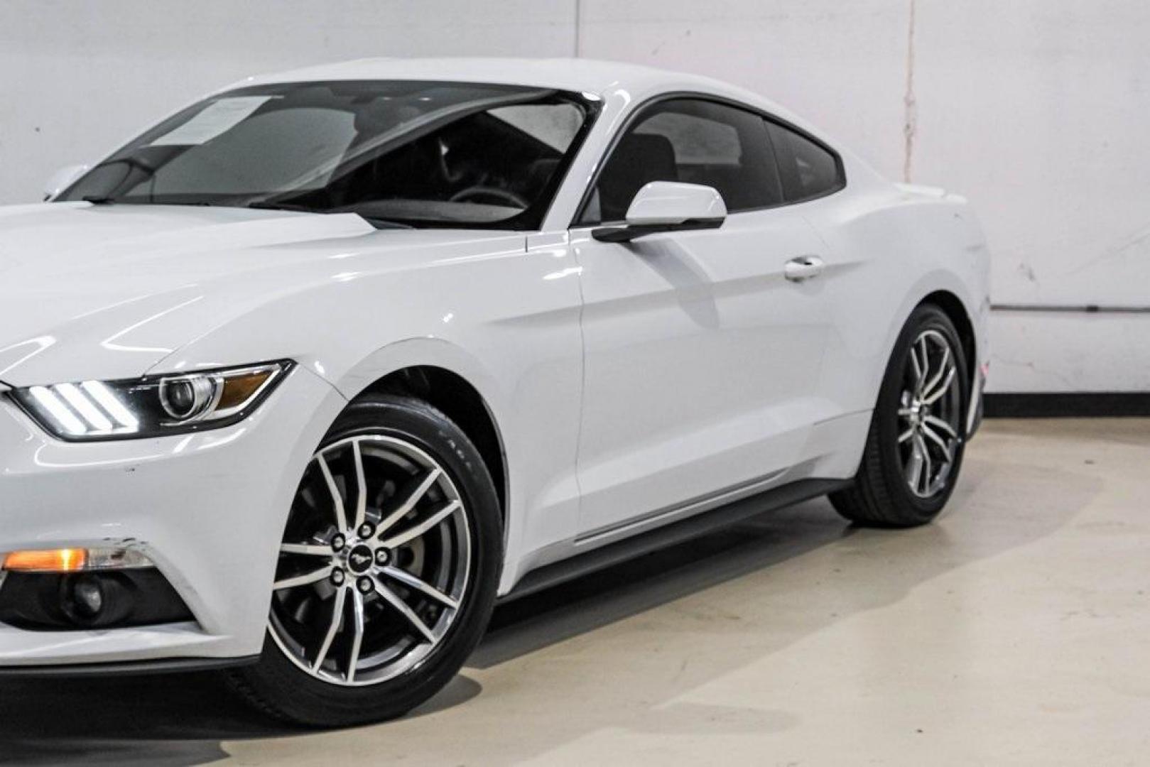 2017 Oxford White /Ebony Ford Mustang EcoBoost Premium (1FA6P8TH0H5) with an EcoBoost 2.3L I4 GTDi DOHC Turbocharged VCT engine, Automatic transmission, located at 15300 Midway Rd., Addison, TX, 75001, (972) 702-0011, 32.958321, -96.838074 - Photo#5