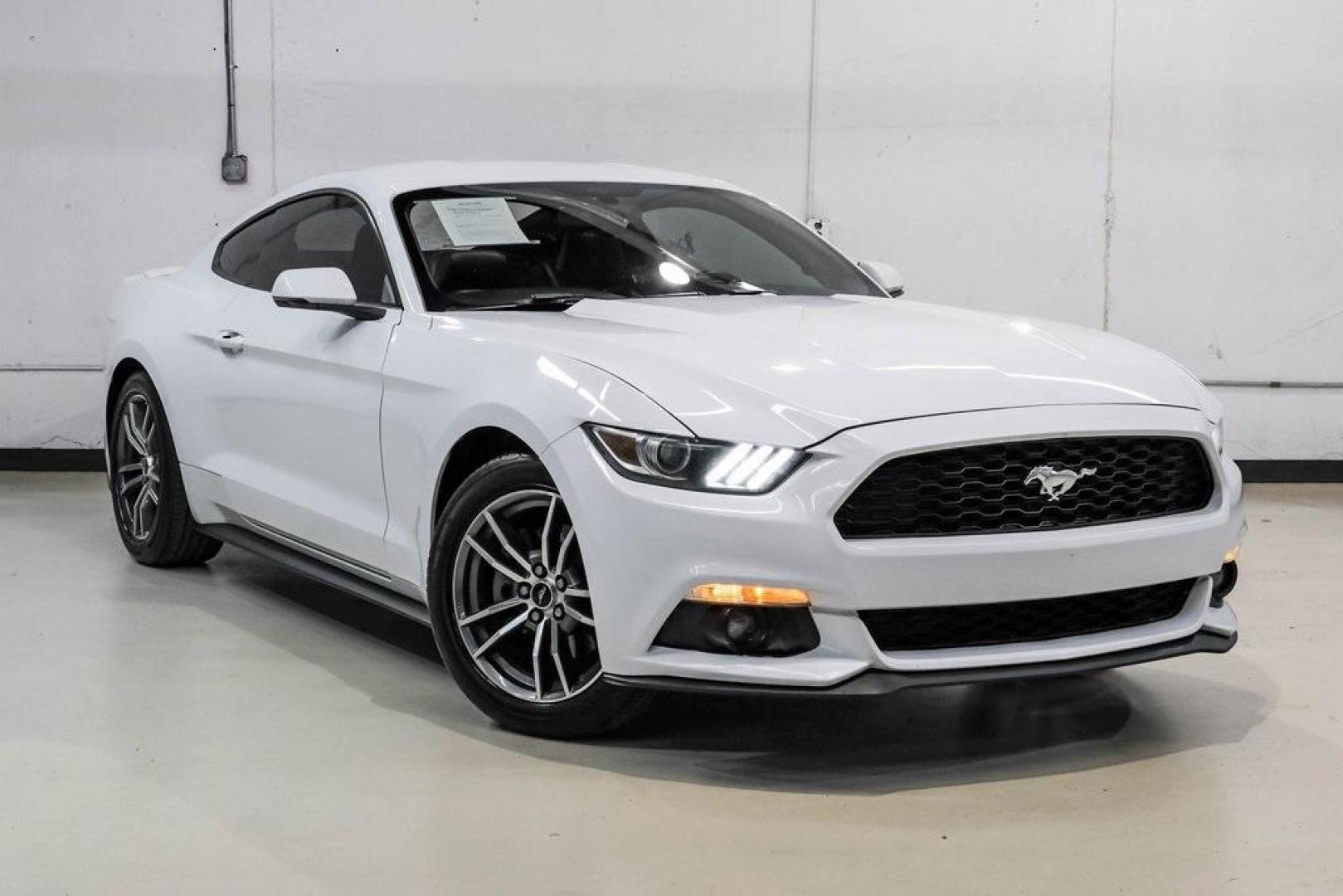 2017 Oxford White /Ebony Ford Mustang EcoBoost Premium (1FA6P8TH0H5) with an EcoBoost 2.3L I4 GTDi DOHC Turbocharged VCT engine, Automatic transmission, located at 15300 Midway Rd., Addison, TX, 75001, (972) 702-0011, 32.958321, -96.838074 - Photo#7