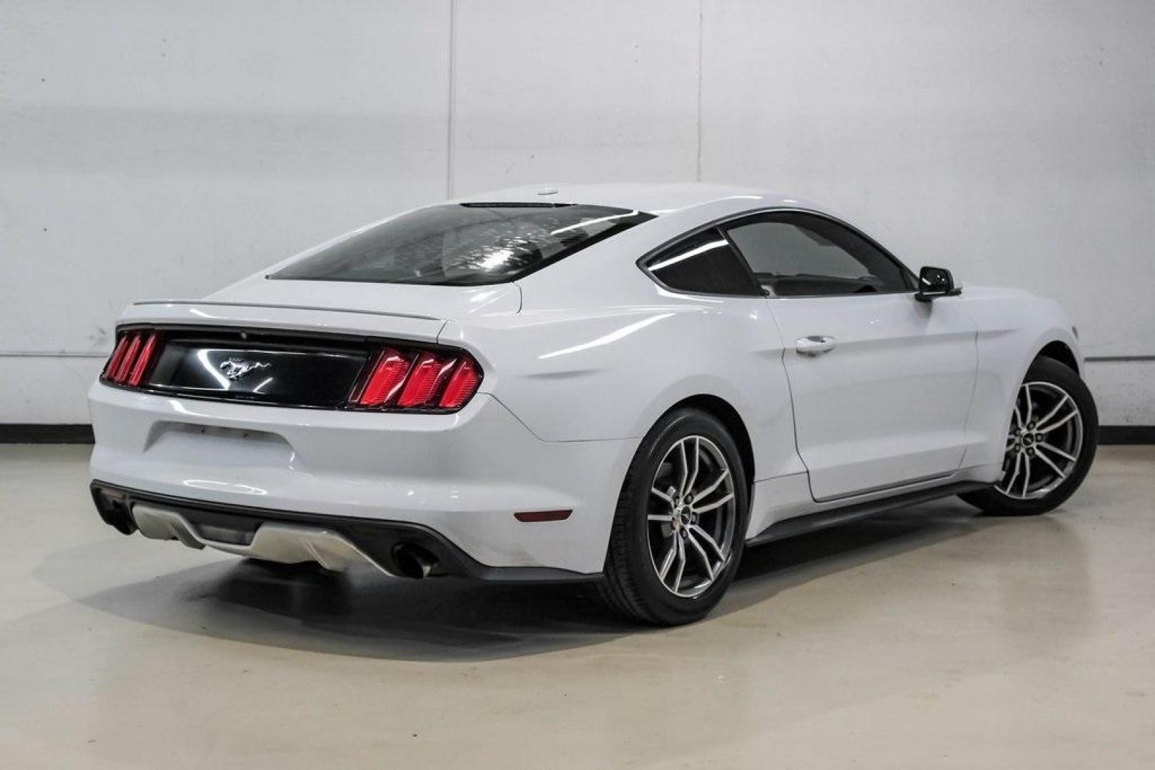 2017 Oxford White /Ebony Ford Mustang EcoBoost Premium (1FA6P8TH0H5) with an EcoBoost 2.3L I4 GTDi DOHC Turbocharged VCT engine, Automatic transmission, located at 15300 Midway Rd., Addison, TX, 75001, (972) 702-0011, 32.958321, -96.838074 - Photo#9