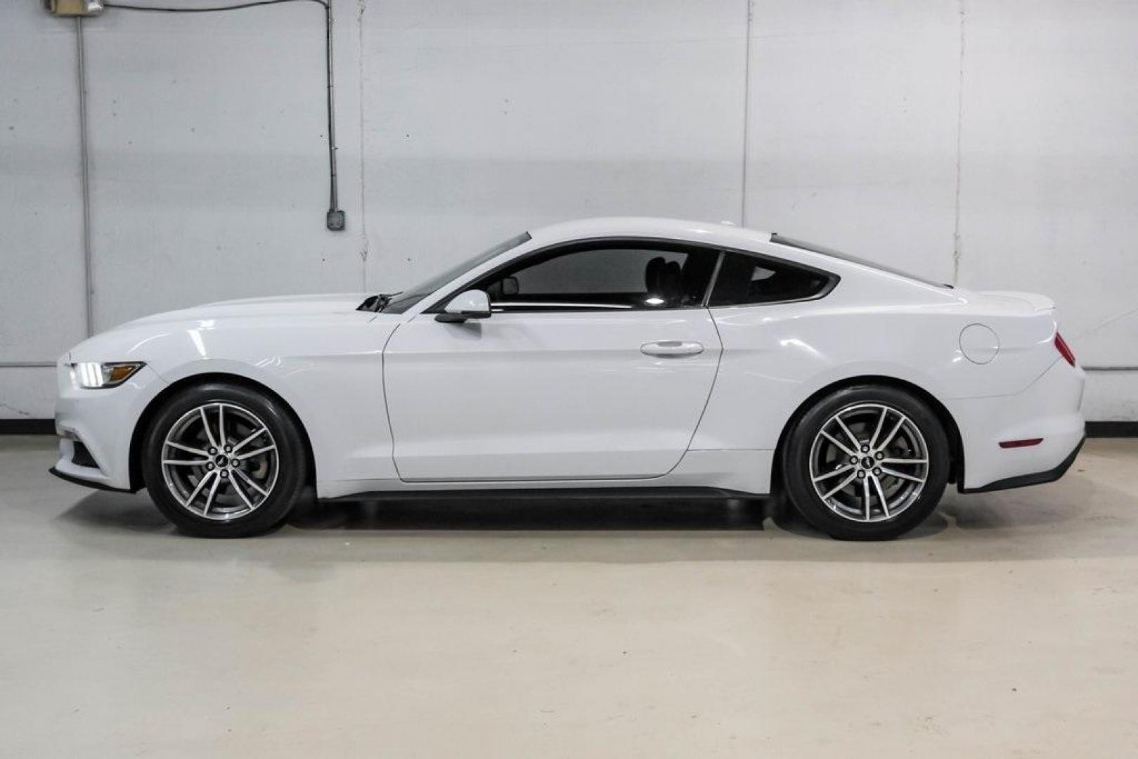 2017 Oxford White /Ebony Ford Mustang EcoBoost Premium (1FA6P8TH0H5) with an EcoBoost 2.3L I4 GTDi DOHC Turbocharged VCT engine, Automatic transmission, located at 15300 Midway Rd., Addison, TX, 75001, (972) 702-0011, 32.958321, -96.838074 - Photo#13