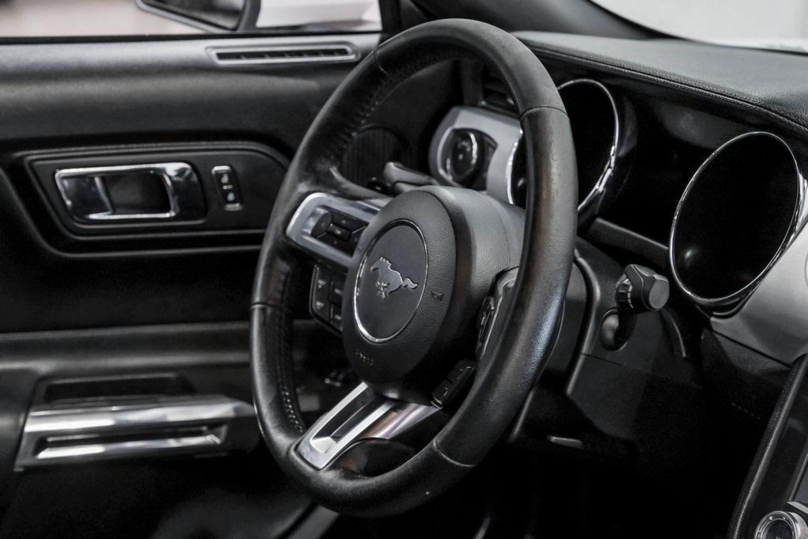 2017 Oxford White /Ebony Ford Mustang EcoBoost Premium (1FA6P8TH0H5) with an EcoBoost 2.3L I4 GTDi DOHC Turbocharged VCT engine, Automatic transmission, located at 15300 Midway Rd., Addison, TX, 75001, (972) 702-0011, 32.958321, -96.838074 - Photo#17