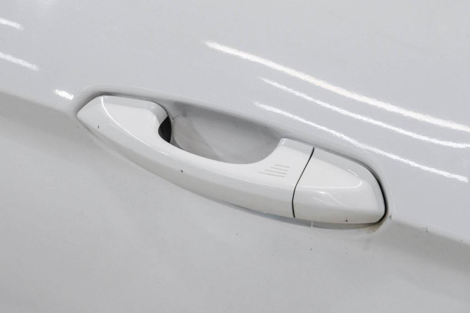 2017 Oxford White /Ebony Ford Mustang EcoBoost Premium (1FA6P8TH0H5) with an EcoBoost 2.3L I4 GTDi DOHC Turbocharged VCT engine, Automatic transmission, located at 15300 Midway Rd., Addison, TX, 75001, (972) 702-0011, 32.958321, -96.838074 - Photo#44