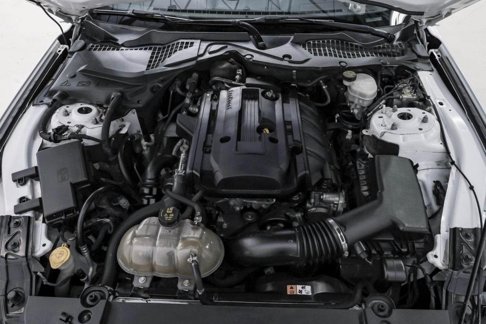 2017 Oxford White /Ebony Ford Mustang EcoBoost Premium (1FA6P8TH0H5) with an EcoBoost 2.3L I4 GTDi DOHC Turbocharged VCT engine, Automatic transmission, located at 15300 Midway Rd., Addison, TX, 75001, (972) 702-0011, 32.958321, -96.838074 - Photo#52