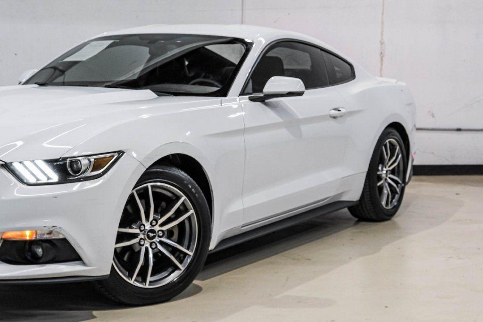 2017 Oxford White /Ebony Ford Mustang EcoBoost Premium (1FA6P8TH0H5) with an EcoBoost 2.3L I4 GTDi DOHC Turbocharged VCT engine, Automatic transmission, located at 15300 Midway Rd., Addison, TX, 75001, (972) 702-0011, 32.958321, -96.838074 - Photo#5