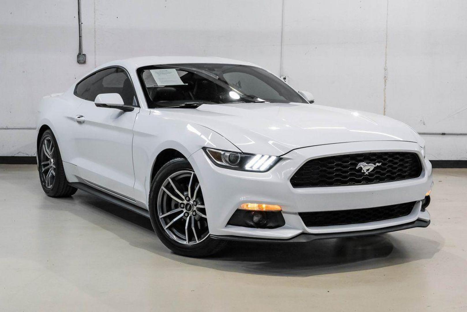 2017 Oxford White /Ebony Ford Mustang EcoBoost Premium (1FA6P8TH0H5) with an EcoBoost 2.3L I4 GTDi DOHC Turbocharged VCT engine, Automatic transmission, located at 15300 Midway Rd., Addison, TX, 75001, (972) 702-0011, 32.958321, -96.838074 - Photo#7