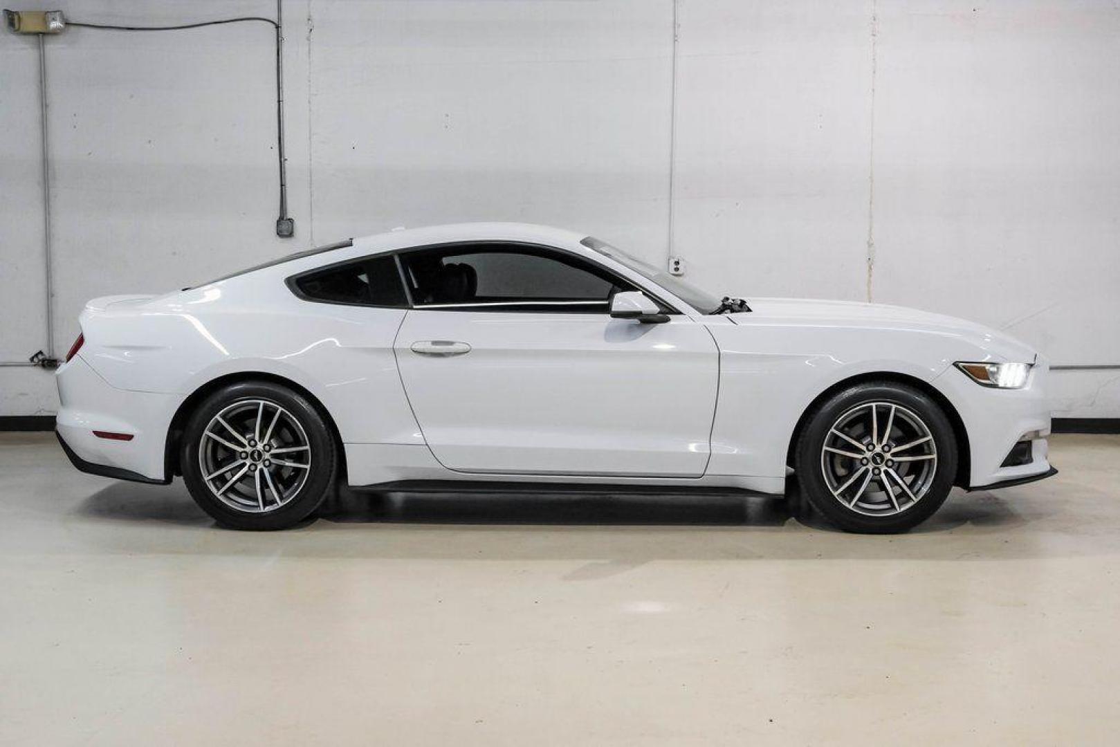 2017 Oxford White /Ebony Ford Mustang EcoBoost Premium (1FA6P8TH0H5) with an EcoBoost 2.3L I4 GTDi DOHC Turbocharged VCT engine, Automatic transmission, located at 15300 Midway Rd., Addison, TX, 75001, (972) 702-0011, 32.958321, -96.838074 - Photo#8