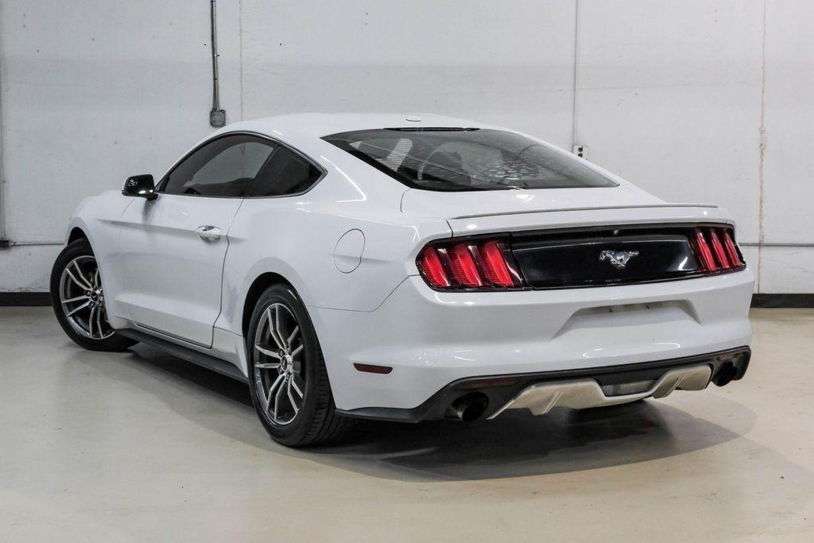 2017 Oxford White /Ebony Ford Mustang EcoBoost Premium (1FA6P8TH0H5) with an EcoBoost 2.3L I4 GTDi DOHC Turbocharged VCT engine, Automatic transmission, located at 15300 Midway Rd., Addison, TX, 75001, (972) 702-0011, 32.958321, -96.838074 - Photo#10
