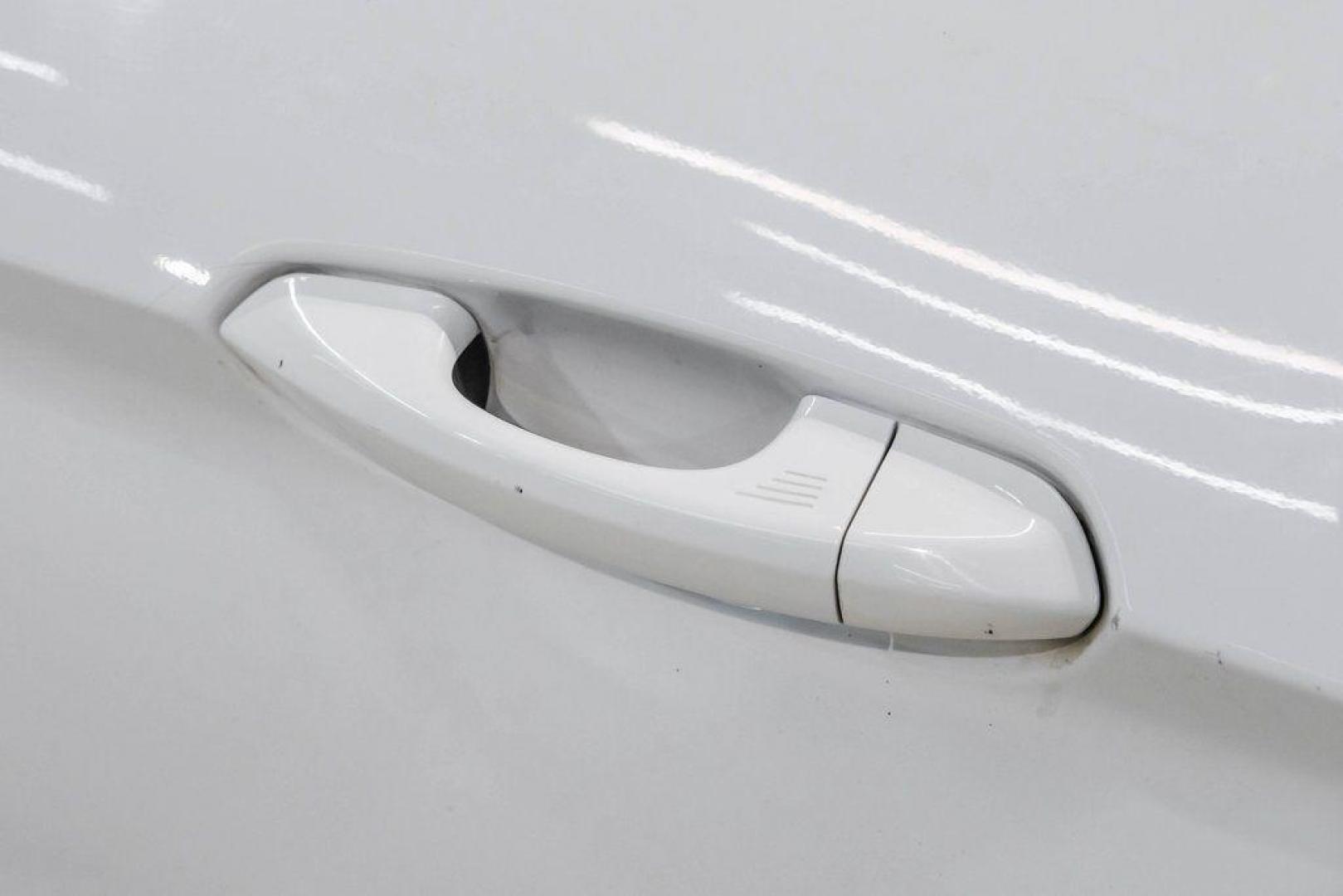 2017 Oxford White /Ebony Ford Mustang EcoBoost Premium (1FA6P8TH0H5) with an EcoBoost 2.3L I4 GTDi DOHC Turbocharged VCT engine, Automatic transmission, located at 15300 Midway Rd., Addison, TX, 75001, (972) 702-0011, 32.958321, -96.838074 - Photo#44