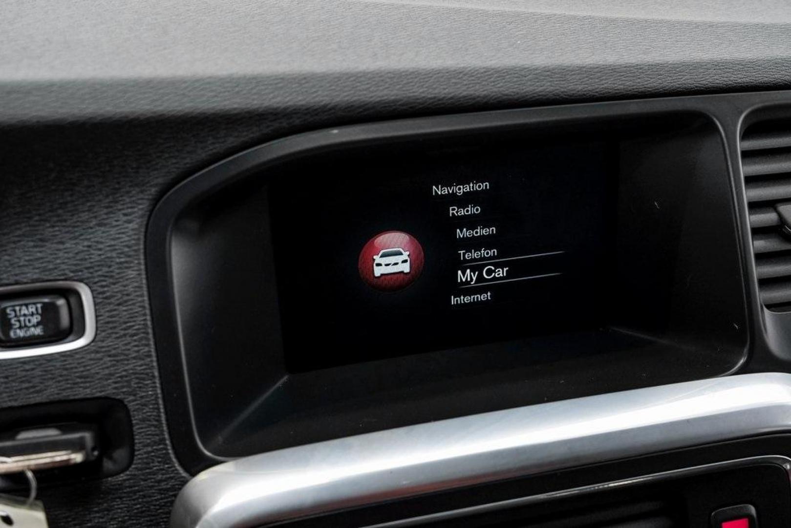 2016 Bright Silver Metallic /Off-Black Volvo S60 T5 Premier (YV1612TK7G2) with an 2.5L I5 20V Turbocharged engine, Automatic transmission, located at 15300 Midway Rd., Addison, TX, 75001, (972) 702-0011, 32.958321, -96.838074 - Photo#33