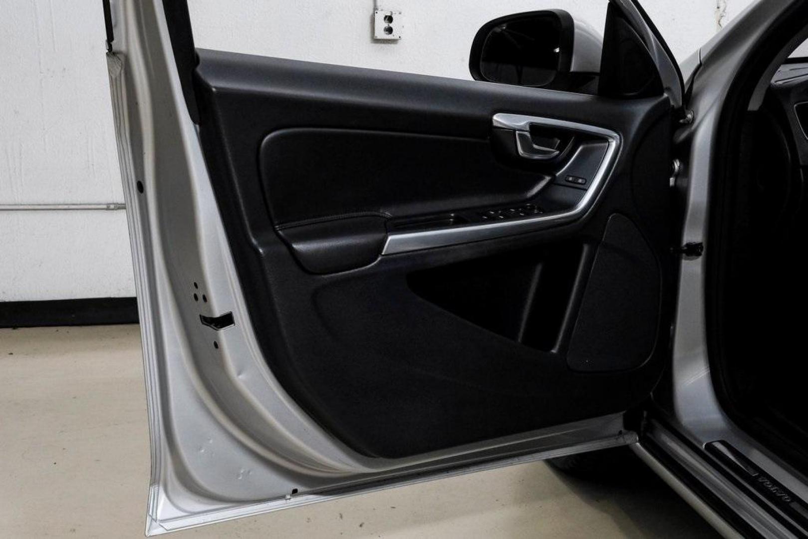 2016 Bright Silver Metallic /Off-Black Volvo S60 T5 Premier (YV1612TK7G2) with an 2.5L I5 20V Turbocharged engine, Automatic transmission, located at 15300 Midway Rd., Addison, TX, 75001, (972) 702-0011, 32.958321, -96.838074 - Photo#46