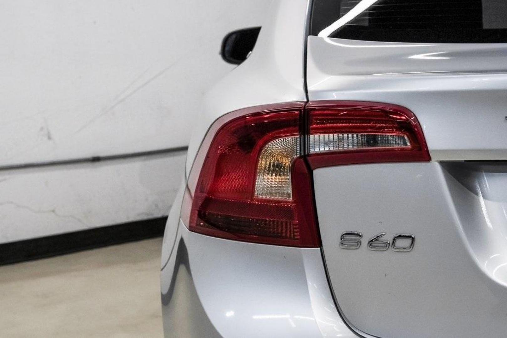 2016 Bright Silver Metallic /Off-Black Volvo S60 T5 Premier (YV1612TK7G2) with an 2.5L I5 20V Turbocharged engine, Automatic transmission, located at 15300 Midway Rd., Addison, TX, 75001, (972) 702-0011, 32.958321, -96.838074 - Photo#52