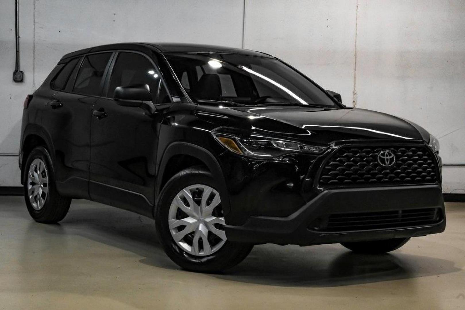 2025 Jet Black /Black Toyota Corolla Cross L (7MUAAAAG6SV) with an 2.0L I4 PDI DOHC 16V LEV3-SULEV30 169hp engine, CVT transmission, located at 15300 Midway Rd., Addison, TX, 75001, (972) 702-0011, 32.958321, -96.838074 - Photo#7