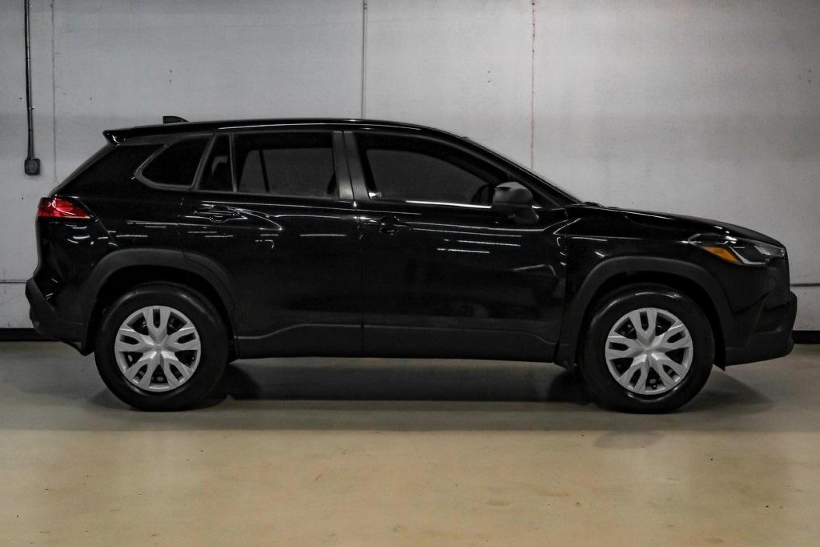 2025 Jet Black /Black Toyota Corolla Cross L (7MUAAAAG6SV) with an 2.0L I4 PDI DOHC 16V LEV3-SULEV30 169hp engine, CVT transmission, located at 15300 Midway Rd., Addison, TX, 75001, (972) 702-0011, 32.958321, -96.838074 - Photo#8