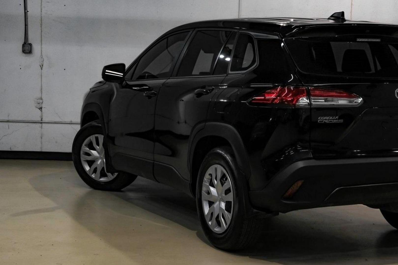 2025 Jet Black /Black Toyota Corolla Cross L (7MUAAAAG6SV) with an 2.0L I4 PDI DOHC 16V LEV3-SULEV30 169hp engine, CVT transmission, located at 15300 Midway Rd., Addison, TX, 75001, (972) 702-0011, 32.958321, -96.838074 - Photo#12