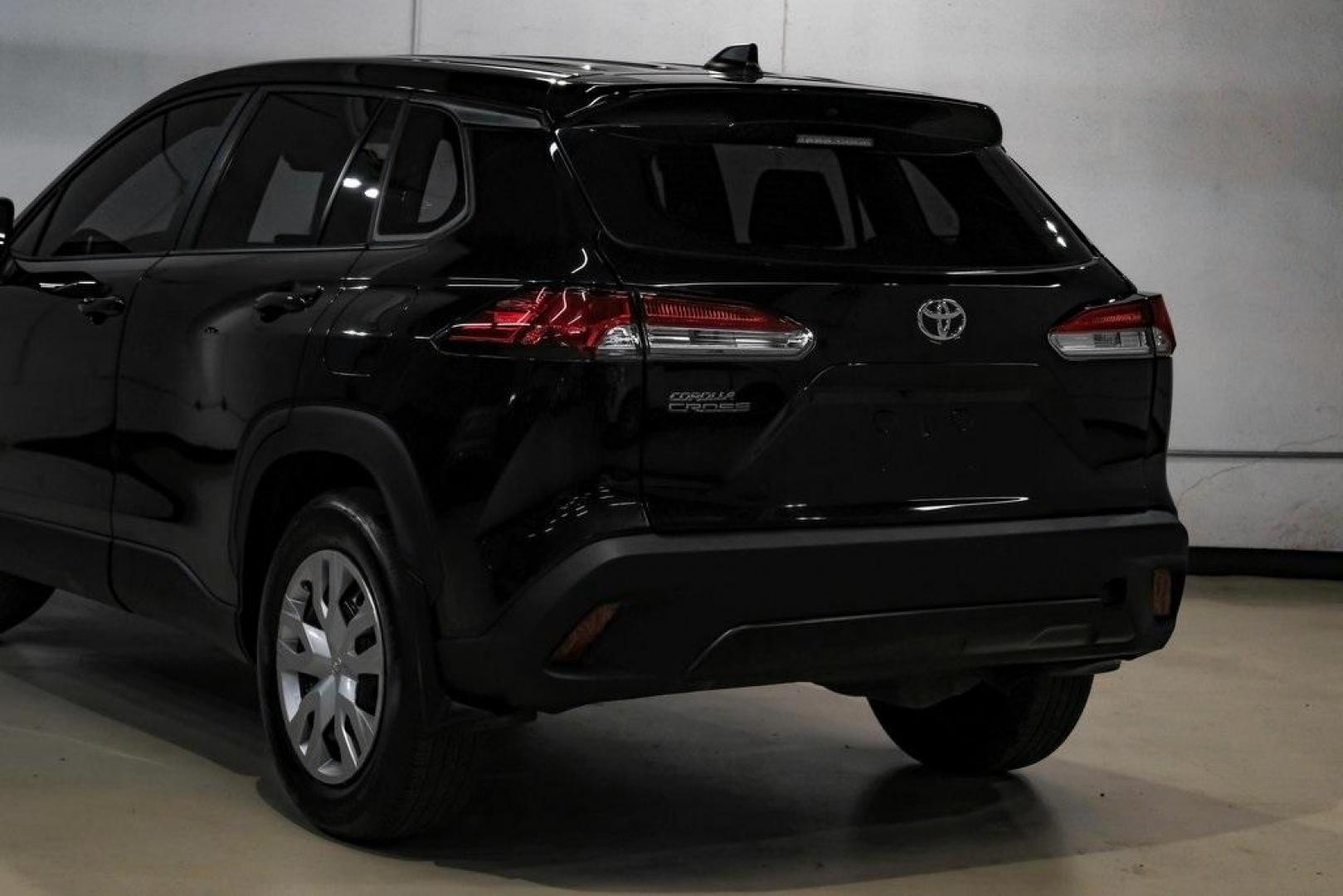 2025 Jet Black /Black Toyota Corolla Cross L (7MUAAAAG6SV) with an 2.0L I4 PDI DOHC 16V LEV3-SULEV30 169hp engine, CVT transmission, located at 15300 Midway Rd., Addison, TX, 75001, (972) 702-0011, 32.958321, -96.838074 - Photo#13