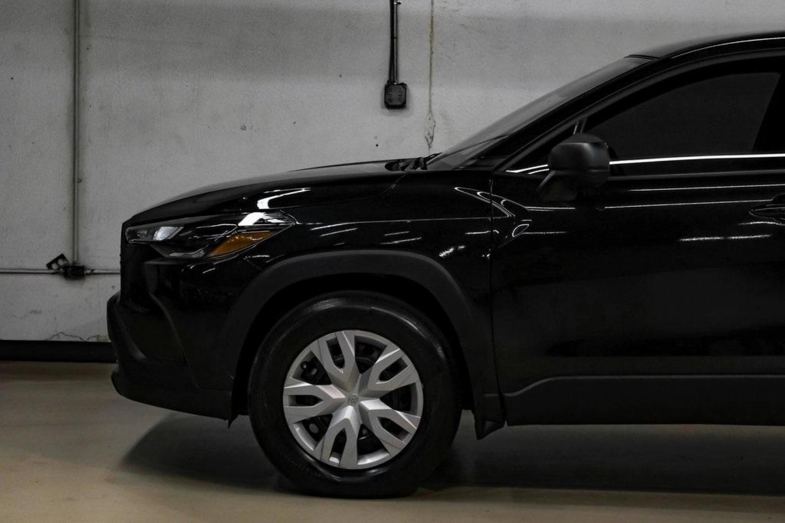 2025 Jet Black /Black Toyota Corolla Cross L (7MUAAAAG6SV) with an 2.0L I4 PDI DOHC 16V LEV3-SULEV30 169hp engine, CVT transmission, located at 15300 Midway Rd., Addison, TX, 75001, (972) 702-0011, 32.958321, -96.838074 - Photo#15