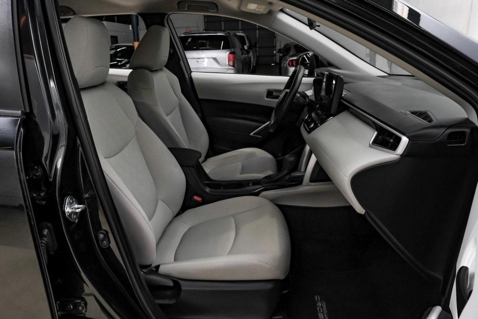 2025 Jet Black /Black Toyota Corolla Cross L (7MUAAAAG6SV) with an 2.0L I4 PDI DOHC 16V LEV3-SULEV30 169hp engine, CVT transmission, located at 15300 Midway Rd., Addison, TX, 75001, (972) 702-0011, 32.958321, -96.838074 - Photo#40