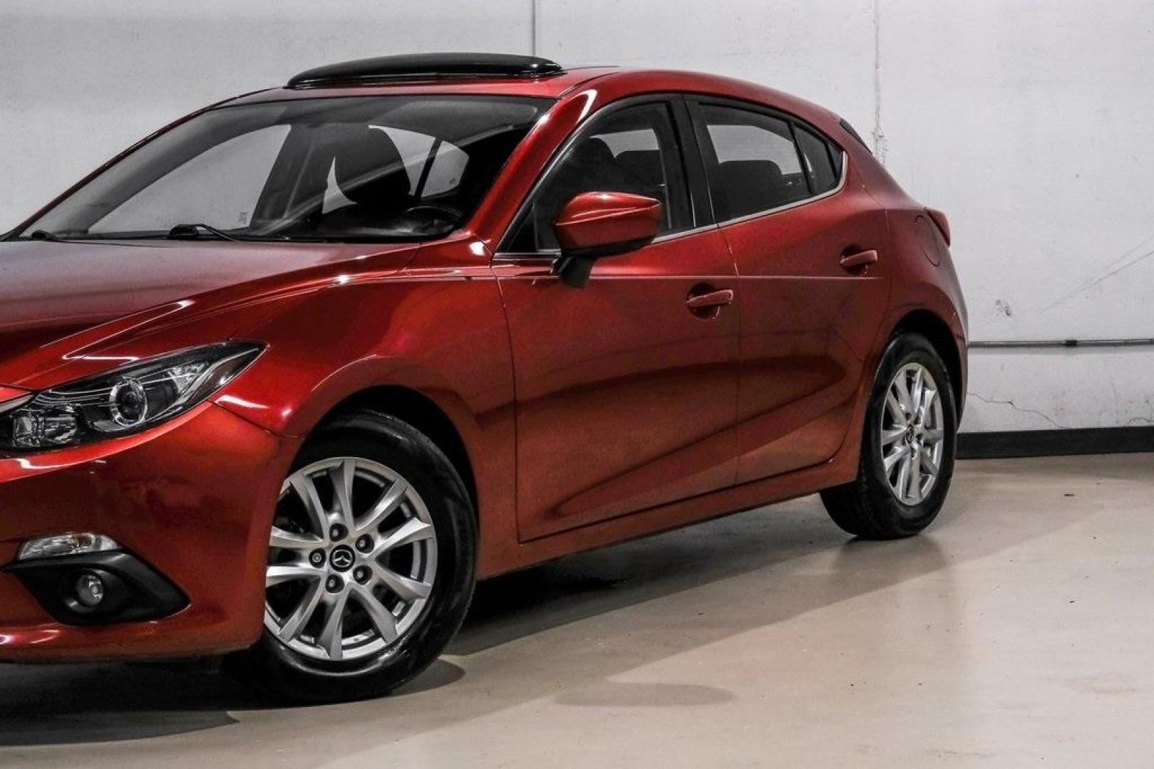 2015 Soul Red Metallic /Black Mazda Mazda3 i Grand Touring (3MZBM1M79FM) with an SKYACTIV-G 2.0L 4-Cylinder DOHC 16V engine, Manual transmission, located at 15300 Midway Rd., Addison, TX, 75001, (972) 702-0011, 32.958321, -96.838074 - Photo#6
