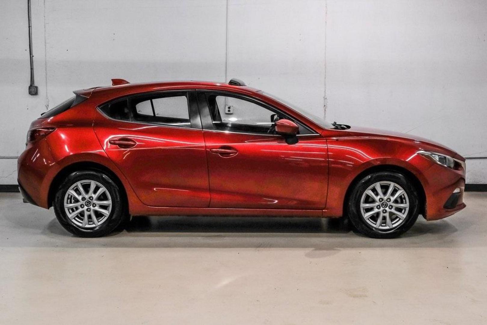 2015 Soul Red Metallic /Black Mazda Mazda3 i Grand Touring (3MZBM1M79FM) with an SKYACTIV-G 2.0L 4-Cylinder DOHC 16V engine, Manual transmission, located at 15300 Midway Rd., Addison, TX, 75001, (972) 702-0011, 32.958321, -96.838074 - Photo#9