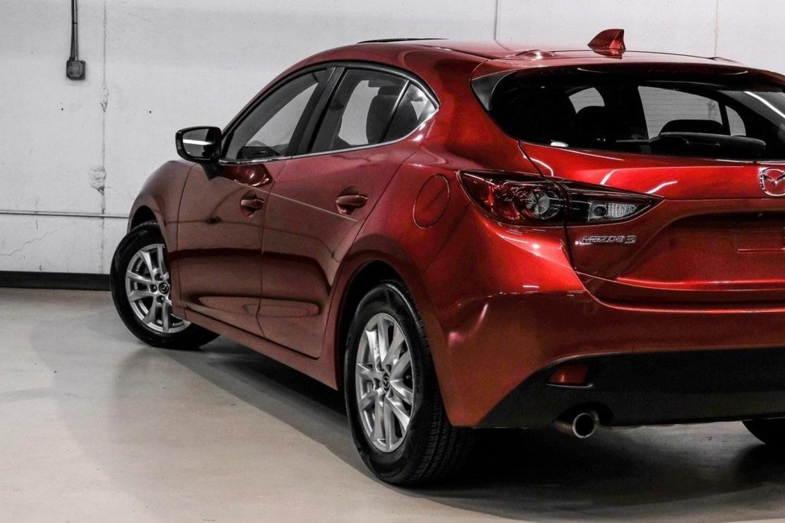 2015 Soul Red Metallic /Black Mazda Mazda3 i Grand Touring (3MZBM1M79FM) with an SKYACTIV-G 2.0L 4-Cylinder DOHC 16V engine, Manual transmission, located at 15300 Midway Rd., Addison, TX, 75001, (972) 702-0011, 32.958321, -96.838074 - Photo#13