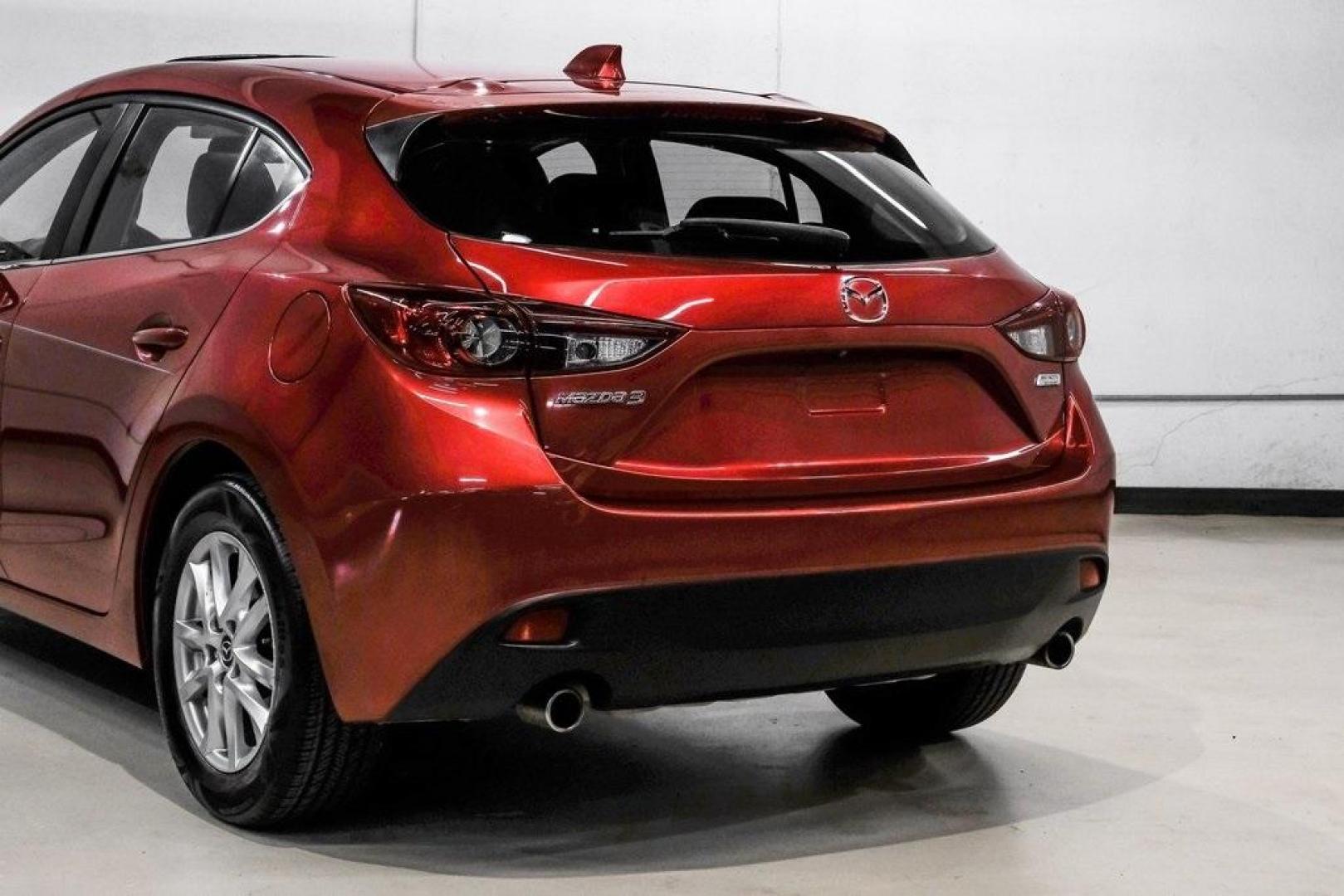 2015 Soul Red Metallic /Black Mazda Mazda3 i Grand Touring (3MZBM1M79FM) with an SKYACTIV-G 2.0L 4-Cylinder DOHC 16V engine, Manual transmission, located at 15300 Midway Rd., Addison, TX, 75001, (972) 702-0011, 32.958321, -96.838074 - Photo#14