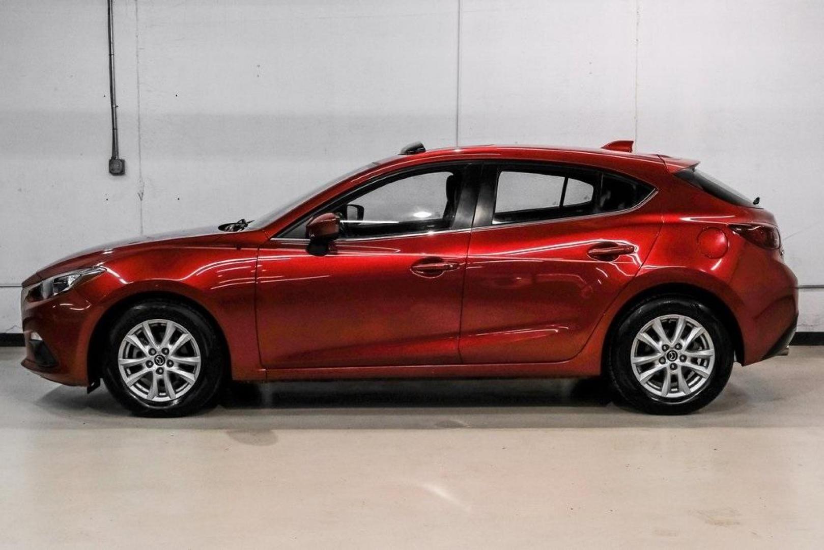 2015 Soul Red Metallic /Black Mazda Mazda3 i Grand Touring (3MZBM1M79FM) with an SKYACTIV-G 2.0L 4-Cylinder DOHC 16V engine, Manual transmission, located at 15300 Midway Rd., Addison, TX, 75001, (972) 702-0011, 32.958321, -96.838074 - Photo#15
