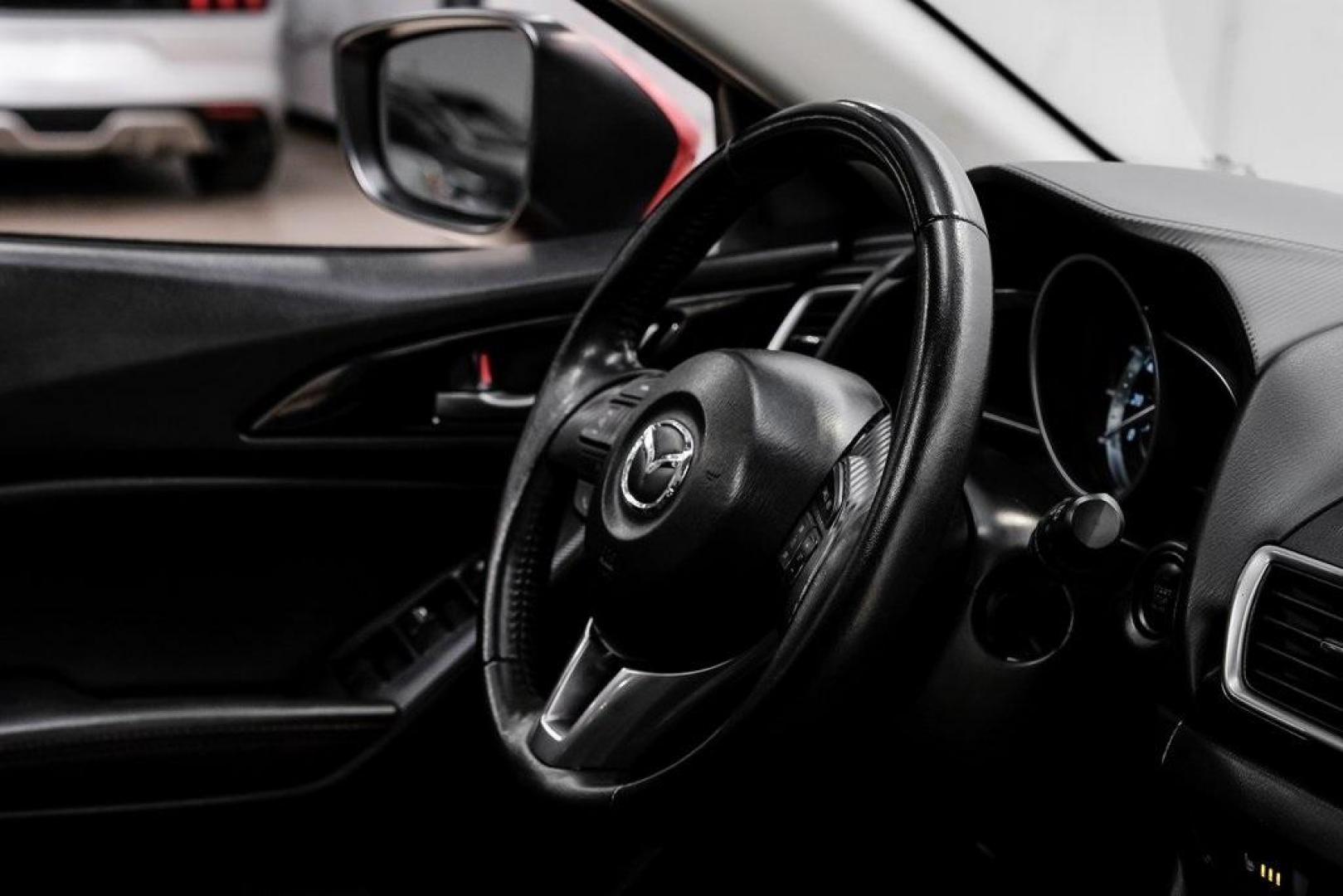 2015 Soul Red Metallic /Black Mazda Mazda3 i Grand Touring (3MZBM1M79FM) with an SKYACTIV-G 2.0L 4-Cylinder DOHC 16V engine, Manual transmission, located at 15300 Midway Rd., Addison, TX, 75001, (972) 702-0011, 32.958321, -96.838074 - Photo#20