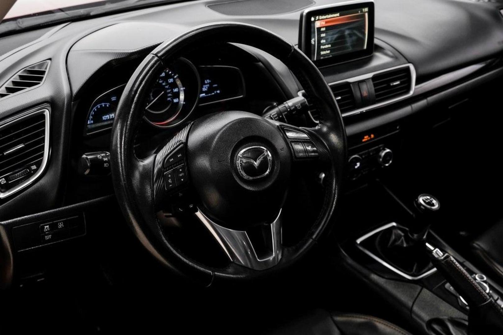 2015 Soul Red Metallic /Black Mazda Mazda3 i Grand Touring (3MZBM1M79FM) with an SKYACTIV-G 2.0L 4-Cylinder DOHC 16V engine, Manual transmission, located at 15300 Midway Rd., Addison, TX, 75001, (972) 702-0011, 32.958321, -96.838074 - Photo#21