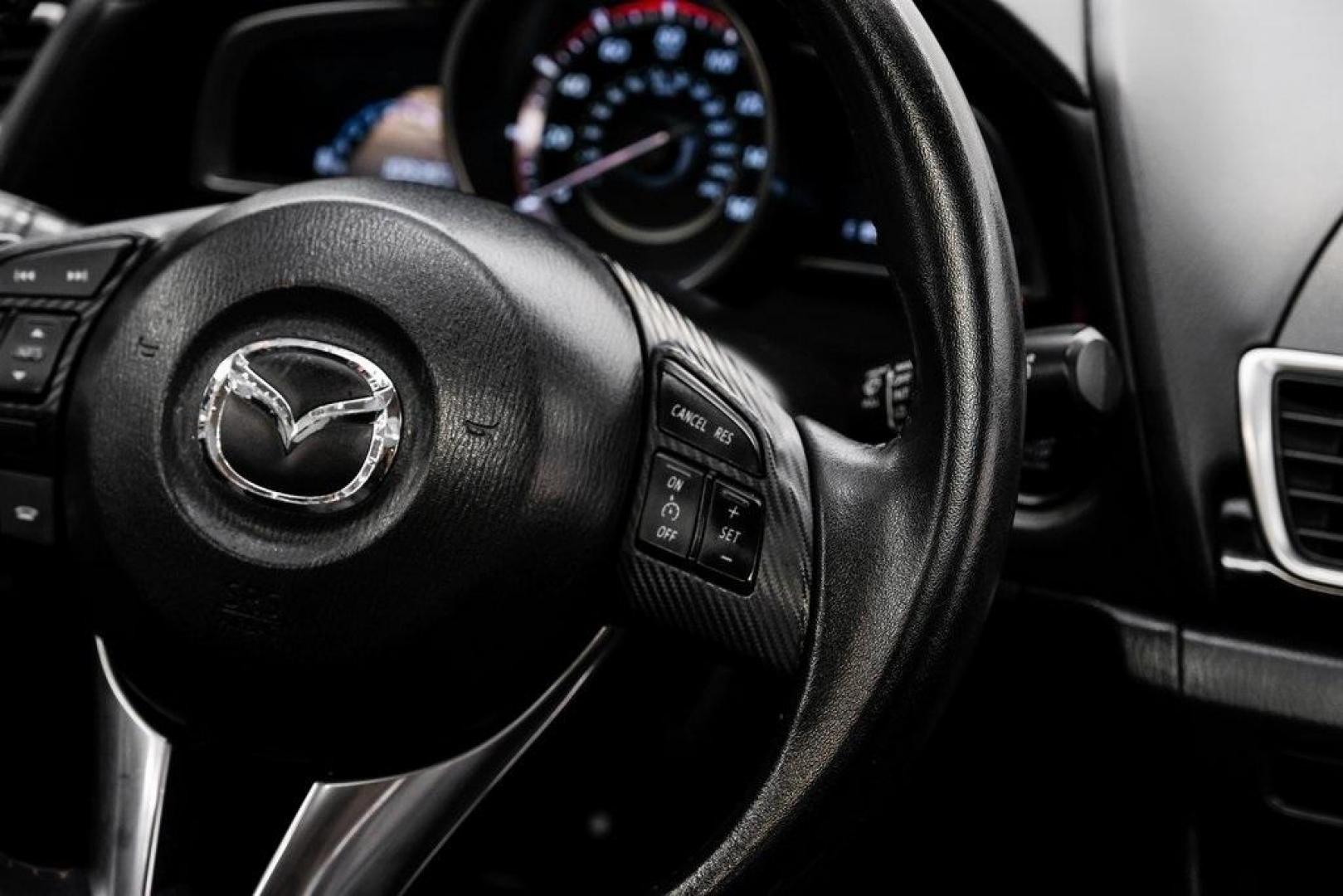 2015 Soul Red Metallic /Black Mazda Mazda3 i Grand Touring (3MZBM1M79FM) with an SKYACTIV-G 2.0L 4-Cylinder DOHC 16V engine, Manual transmission, located at 15300 Midway Rd., Addison, TX, 75001, (972) 702-0011, 32.958321, -96.838074 - Photo#23