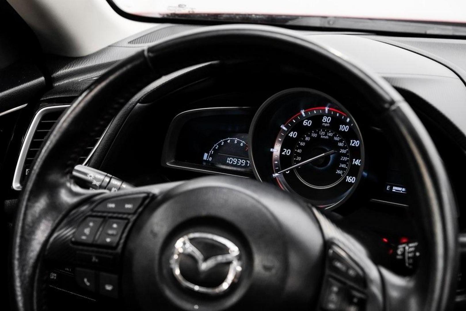 2015 Soul Red Metallic /Black Mazda Mazda3 i Grand Touring (3MZBM1M79FM) with an SKYACTIV-G 2.0L 4-Cylinder DOHC 16V engine, Manual transmission, located at 15300 Midway Rd., Addison, TX, 75001, (972) 702-0011, 32.958321, -96.838074 - Photo#24