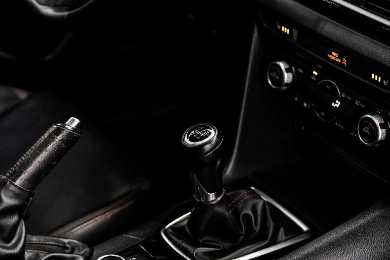 2015 Soul Red Metallic /Black Mazda Mazda3 i Grand Touring (3MZBM1M79FM) with an SKYACTIV-G 2.0L 4-Cylinder DOHC 16V engine, Manual transmission, located at 15300 Midway Rd., Addison, TX, 75001, (972) 702-0011, 32.958321, -96.838074 - Photo#30