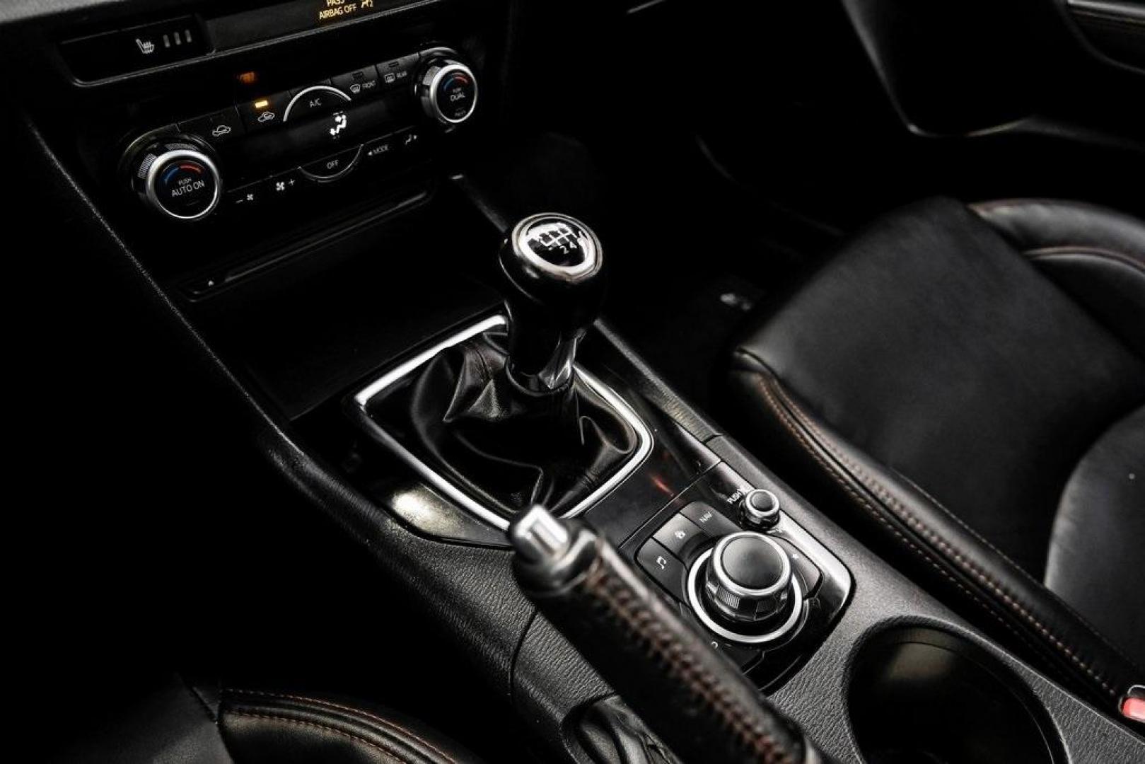 2015 Soul Red Metallic /Black Mazda Mazda3 i Grand Touring (3MZBM1M79FM) with an SKYACTIV-G 2.0L 4-Cylinder DOHC 16V engine, Manual transmission, located at 15300 Midway Rd., Addison, TX, 75001, (972) 702-0011, 32.958321, -96.838074 - Photo#31