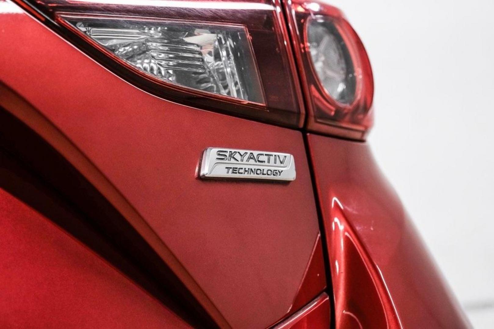 2015 Soul Red Metallic /Black Mazda Mazda3 i Grand Touring (3MZBM1M79FM) with an SKYACTIV-G 2.0L 4-Cylinder DOHC 16V engine, Manual transmission, located at 15300 Midway Rd., Addison, TX, 75001, (972) 702-0011, 32.958321, -96.838074 - Photo#56