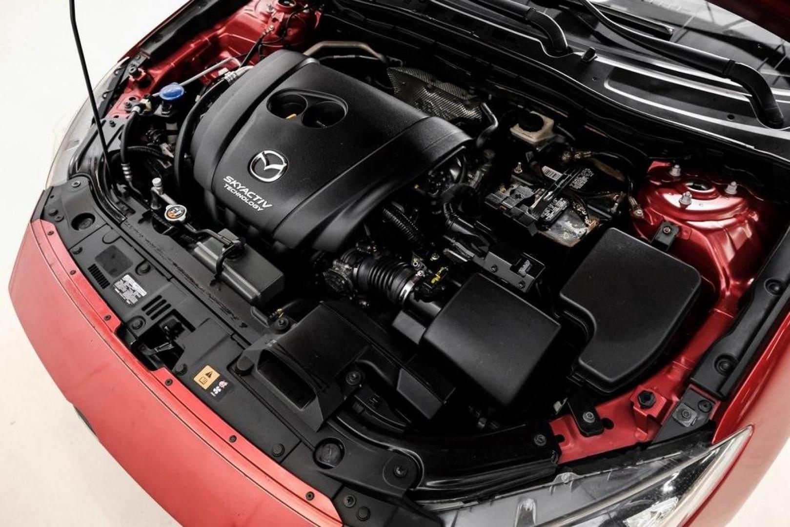 2015 Soul Red Metallic /Black Mazda Mazda3 i Grand Touring (3MZBM1M79FM) with an SKYACTIV-G 2.0L 4-Cylinder DOHC 16V engine, Manual transmission, located at 15300 Midway Rd., Addison, TX, 75001, (972) 702-0011, 32.958321, -96.838074 - Photo#57