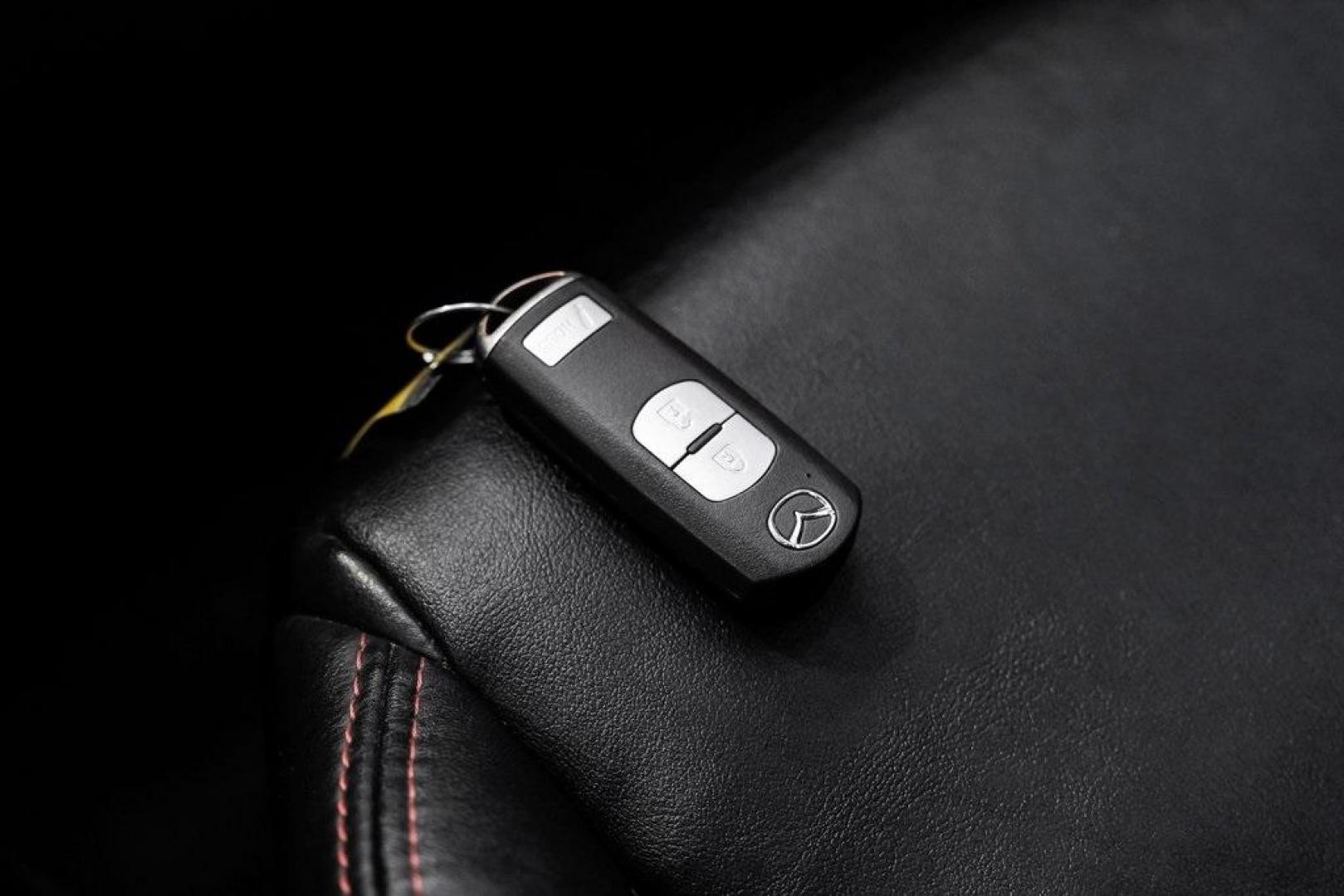 2015 Soul Red Metallic /Black Mazda Mazda3 i Grand Touring (3MZBM1M79FM) with an SKYACTIV-G 2.0L 4-Cylinder DOHC 16V engine, Manual transmission, located at 15300 Midway Rd., Addison, TX, 75001, (972) 702-0011, 32.958321, -96.838074 - Photo#66