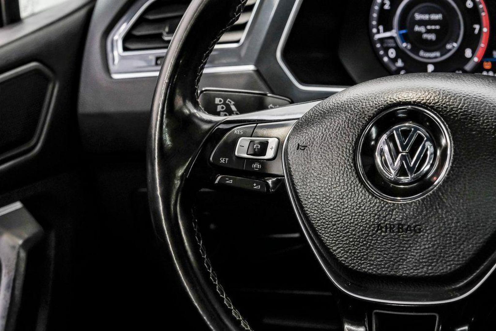 2019 Deep Black /Titan Black Volkswagen Tiguan 2.0T SEL R-Line (3VV2B7AX5KM) with an 2.0L TSI DOHC engine, Automatic transmission, located at 15300 Midway Rd., Addison, TX, 75001, (972) 702-0011, 32.958321, -96.838074 - Photo#22