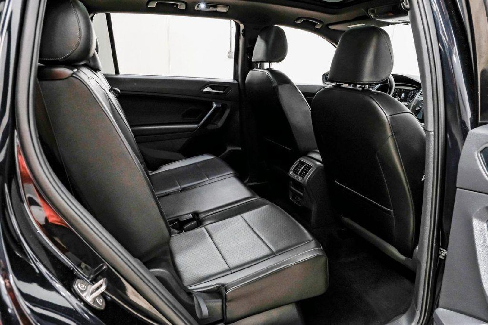 2019 Deep Black /Titan Black Volkswagen Tiguan 2.0T SEL R-Line (3VV2B7AX5KM) with an 2.0L TSI DOHC engine, Automatic transmission, located at 15300 Midway Rd., Addison, TX, 75001, (972) 702-0011, 32.958321, -96.838074 - Photo#42