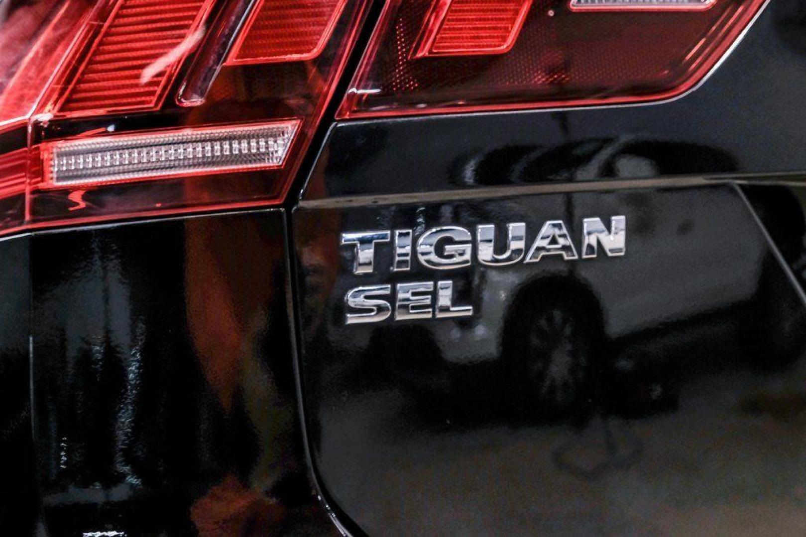2019 Deep Black /Titan Black Volkswagen Tiguan 2.0T SEL R-Line (3VV2B7AX5KM) with an 2.0L TSI DOHC engine, Automatic transmission, located at 15300 Midway Rd., Addison, TX, 75001, (972) 702-0011, 32.958321, -96.838074 - Photo#57