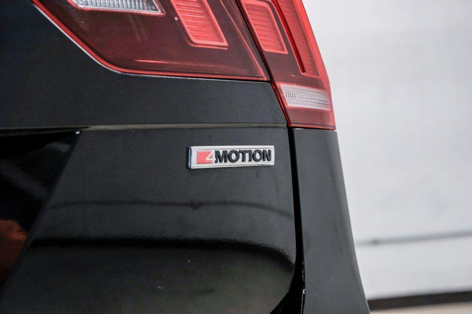 2019 Deep Black /Titan Black Volkswagen Tiguan 2.0T SEL R-Line (3VV2B7AX5KM) with an 2.0L TSI DOHC engine, Automatic transmission, located at 15300 Midway Rd., Addison, TX, 75001, (972) 702-0011, 32.958321, -96.838074 - Photo#58