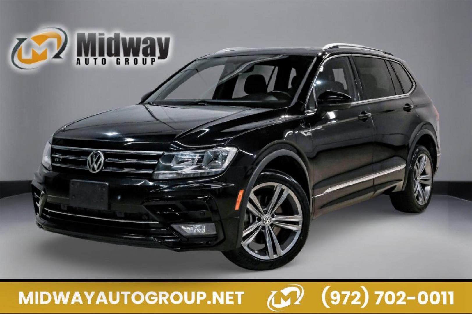 2019 Deep Black /Titan Black Volkswagen Tiguan 2.0T SEL R-Line (3VV2B7AX5KM) with an 2.0L TSI DOHC engine, Automatic transmission, located at 15300 Midway Rd., Addison, TX, 75001, (972) 702-0011, 32.958321, -96.838074- Photo#0