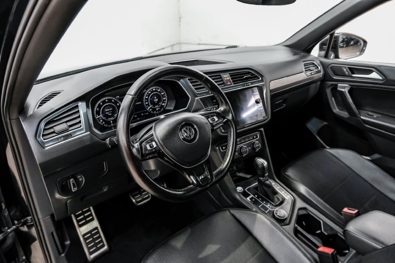 2019 Deep Black /Titan Black Volkswagen Tiguan 2.0T SEL R-Line (3VV2B7AX5KM) with an 2.0L TSI DOHC engine, Automatic transmission, located at 15300 Midway Rd., Addison, TX, 75001, (972) 702-0011, 32.958321, -96.838074- Photo#2
